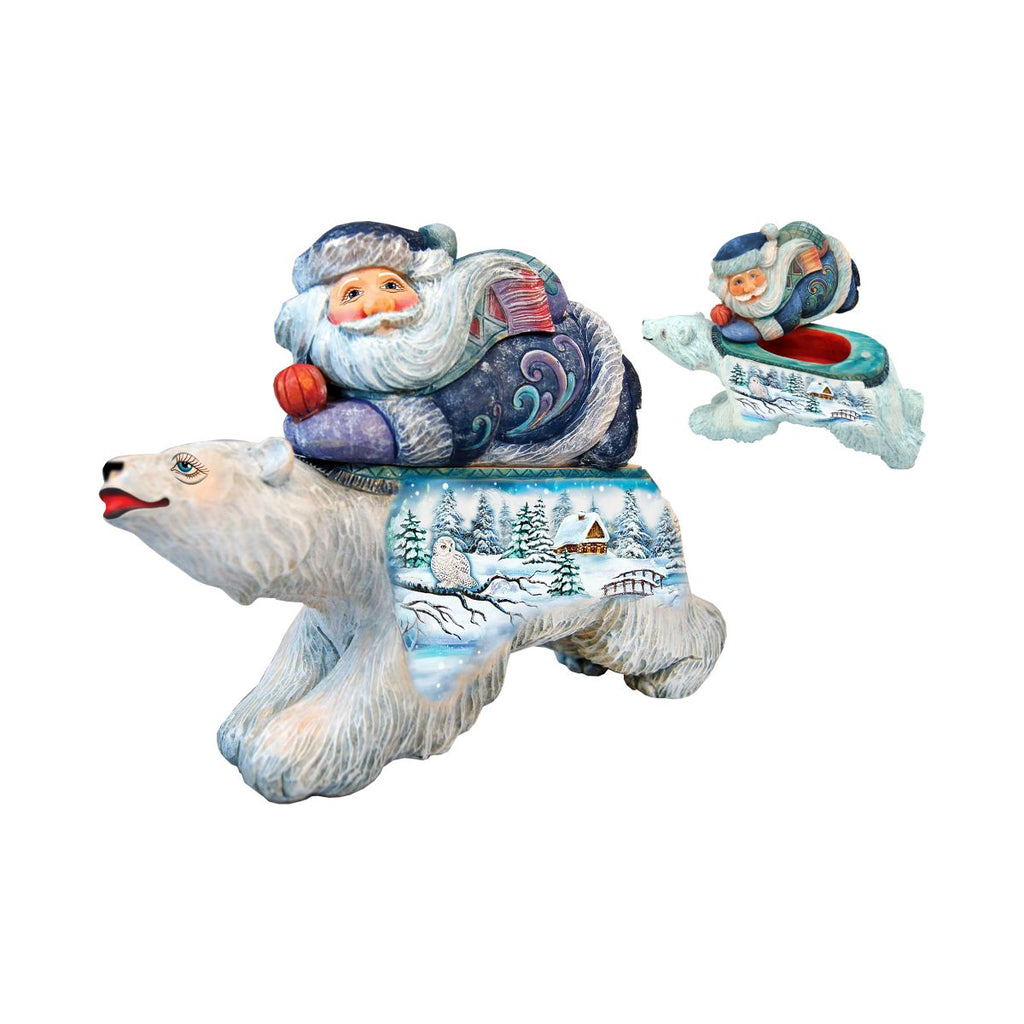 a christmas ornament of a polar bear and santa on a sleigh