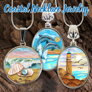 three circular necklaces with different coastal scenes, including a shell, a lighthouse, and a sunset over the ocean.