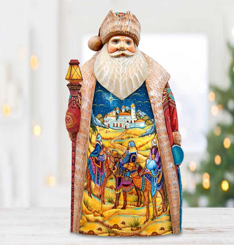 A colorful and detailed figurine of Santa Claus, with intricate designs and patterns depicting a nativity scene.