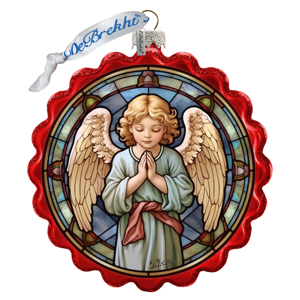 a stained glass window with an angel praying
