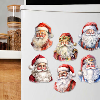 a refrigerator with a bunch of santa claus stickers on it