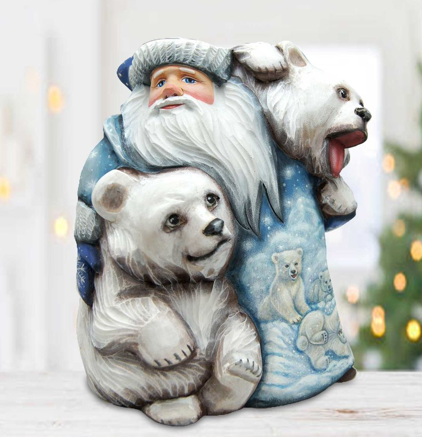 A figurine of Santa Claus holding two polar bears, with a snowy background.