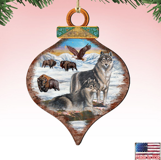 a decorative ornament with a painting of a wolf, a bear, and a bison in a snowy landscape, along with an eagle in the background.