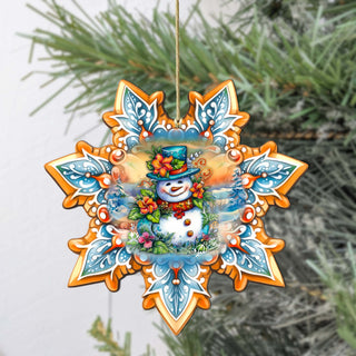 a snowman ornament hanging from a tree