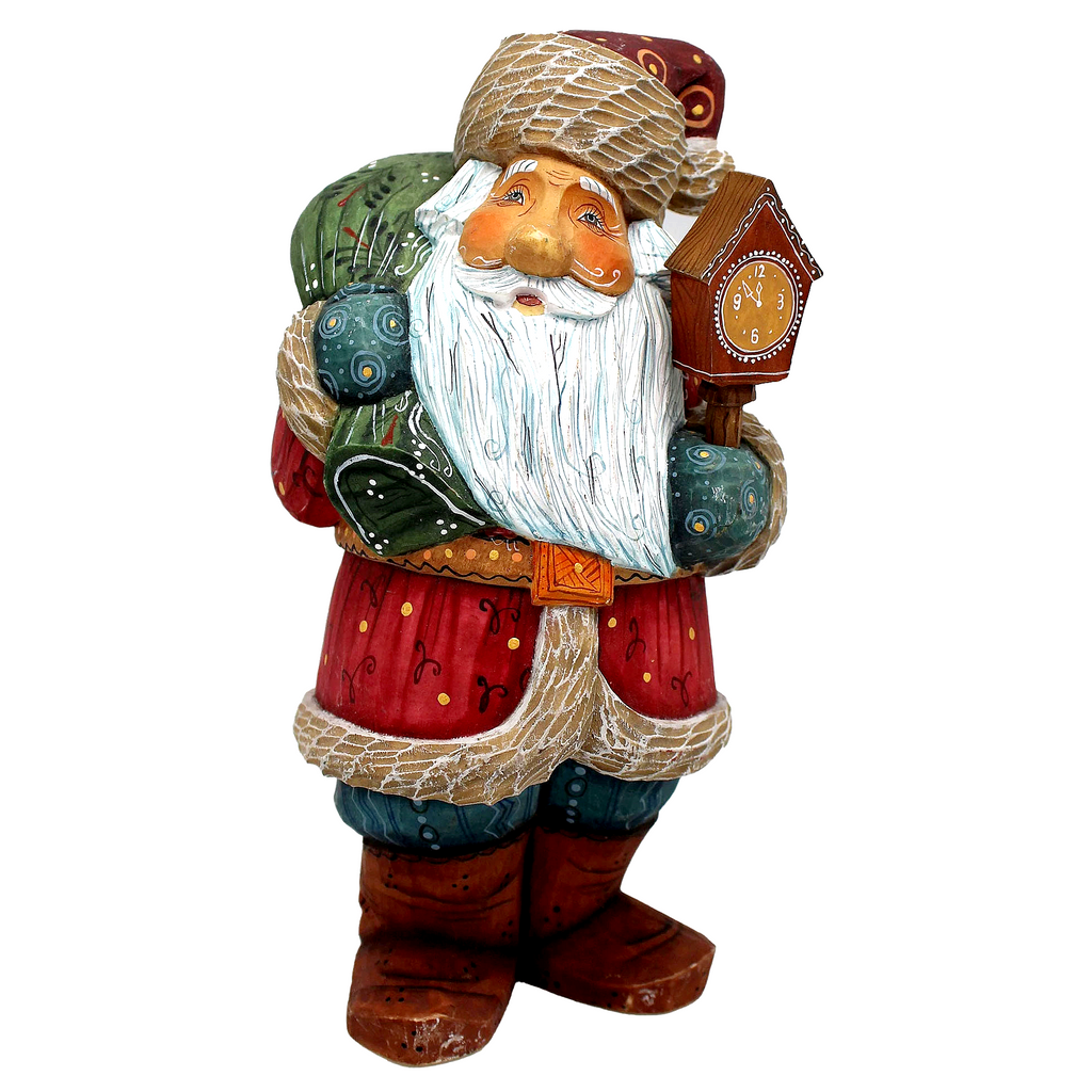 A colorful, hand-painted Santa Claus figurine holding a birdhouse.
