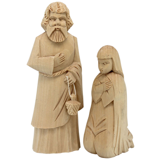 Two wooden carved figures, a bearded man and a kneeling woman, are depicted in the image.