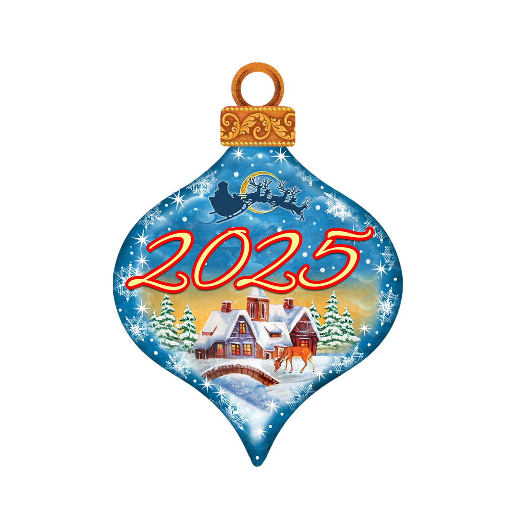 A Christmas ornament with a blue background and a snowy village scene, featuring a Santa Claus sleigh and the number