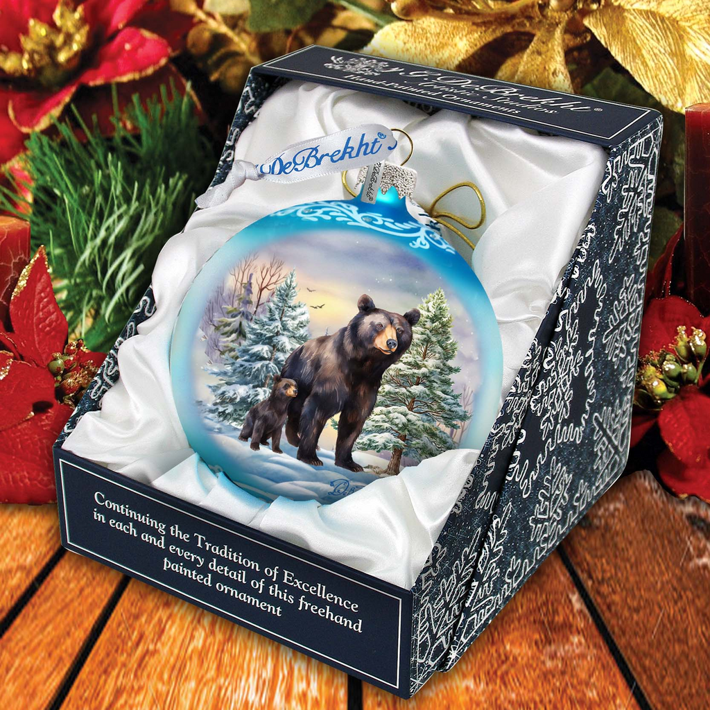 a christmas ornament with a bear inside of it