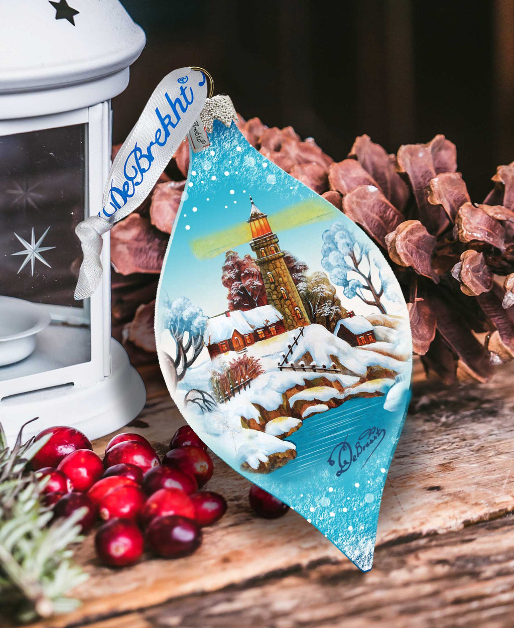 a christmas ornament sitting on top of a wooden table