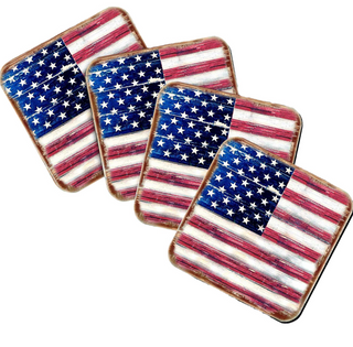 four coasters with the American flag design, arranged in a row.