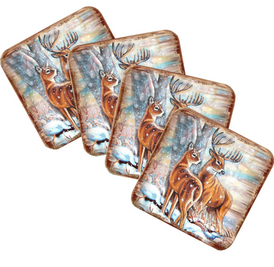 A set of four square coasters featuring a painting of deer in a snowy forest setting.