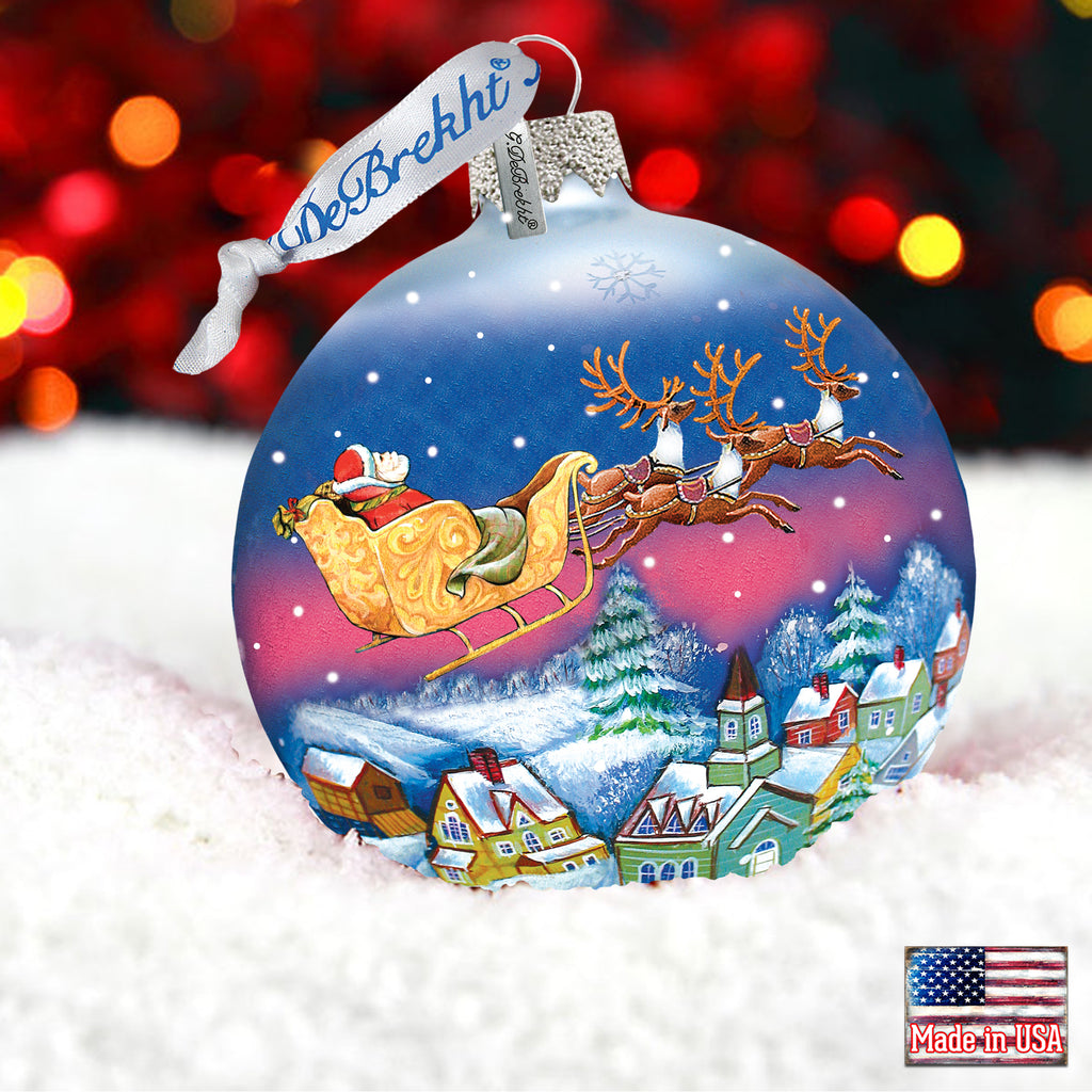 a christmas ornament with a santa sleigh on it