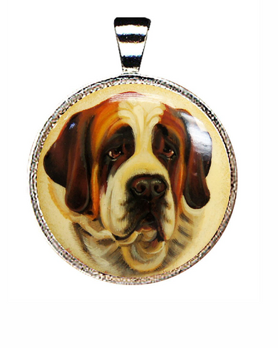 A pendant featuring a close-up portrait of a Saint Bernard dog.