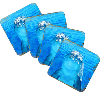 A set of four square coasters with images of a dolphin in the ocean.