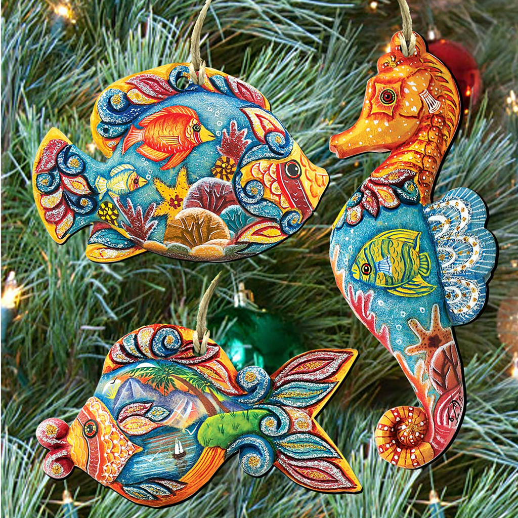 a Christmas tree decorated with colorful ornaments shaped like fish and a seahorse.