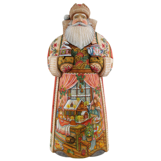 A colorful and intricately detailed wooden Santa Claus figurine, featuring a vibrant and detailed scene of a Christmas tree, ornaments, and other festive elements.