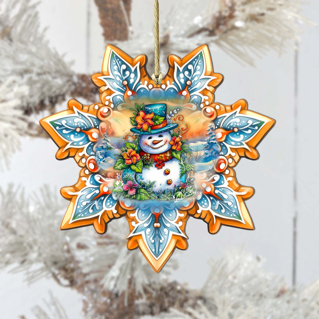 a snowman ornament hanging from a christmas tree