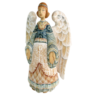 A wooden figurine of an angel with outstretched wings, wearing a blue and white dress with intricate patterns.