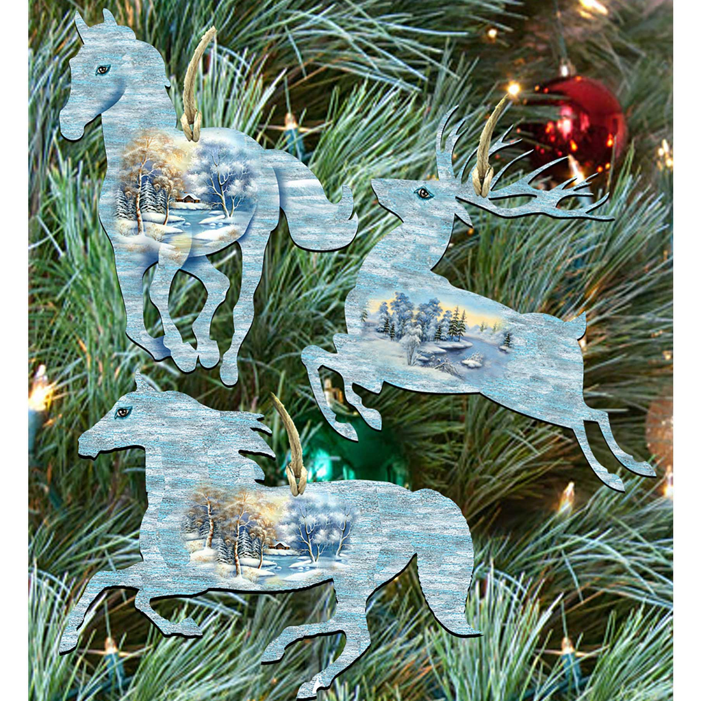 a Christmas tree decorated with various ornaments, including a horse, a deer, and a ball.