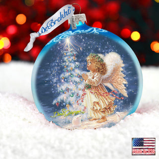a christmas ornament with an angel on it