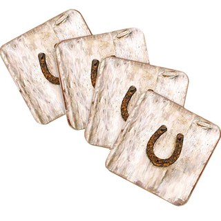 a collection of four square coasters with a rustic, weathered appearance.