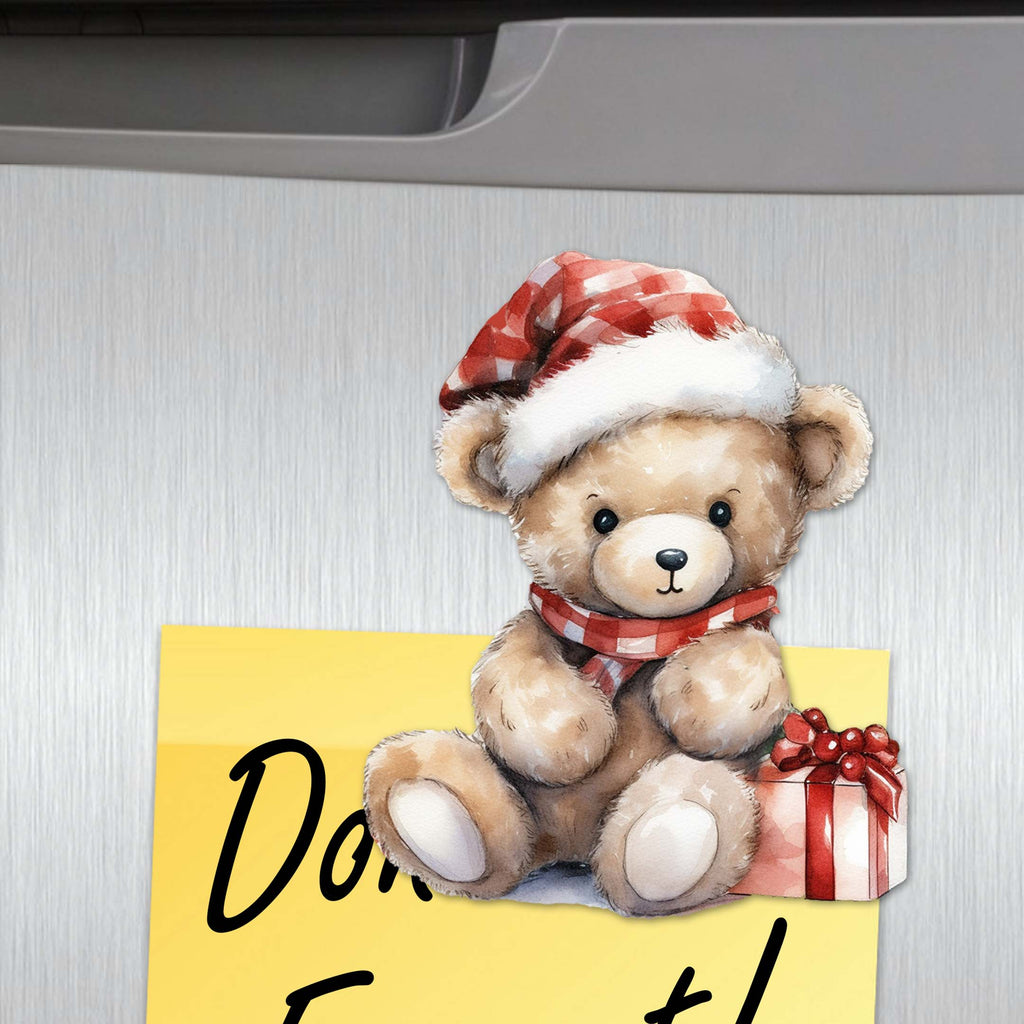 a picture of a teddy bear with a santa hat on