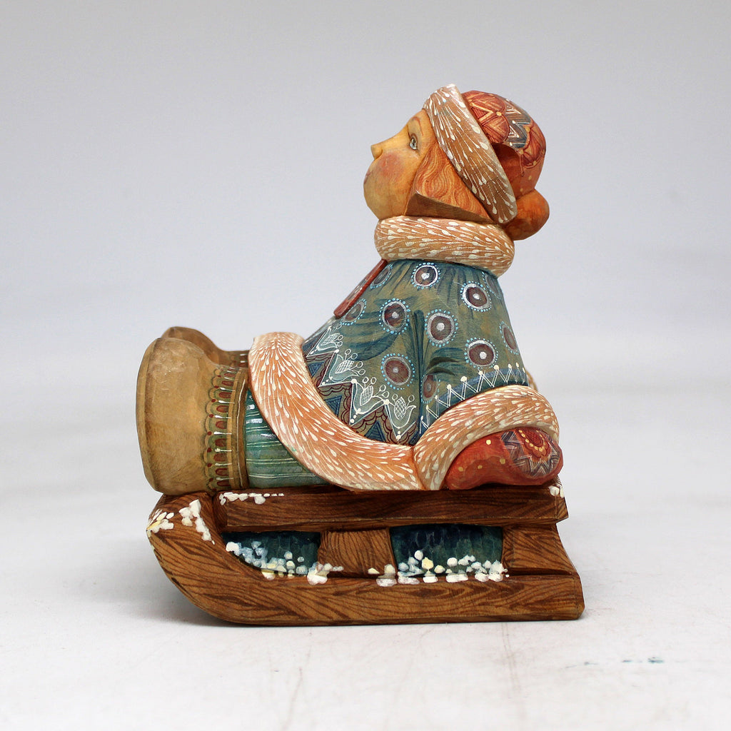 One-of-a-Kind Girl on Sleigh WOODCARVED Figurine 4.5x3.5x3 by G. Debrekht - Unique Handcrafted and Handpainted Collectible