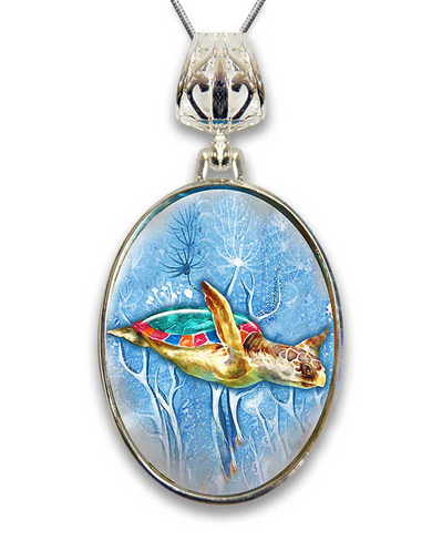 A pendant featuring a colorful painting of a sea turtle swimming in the ocean.