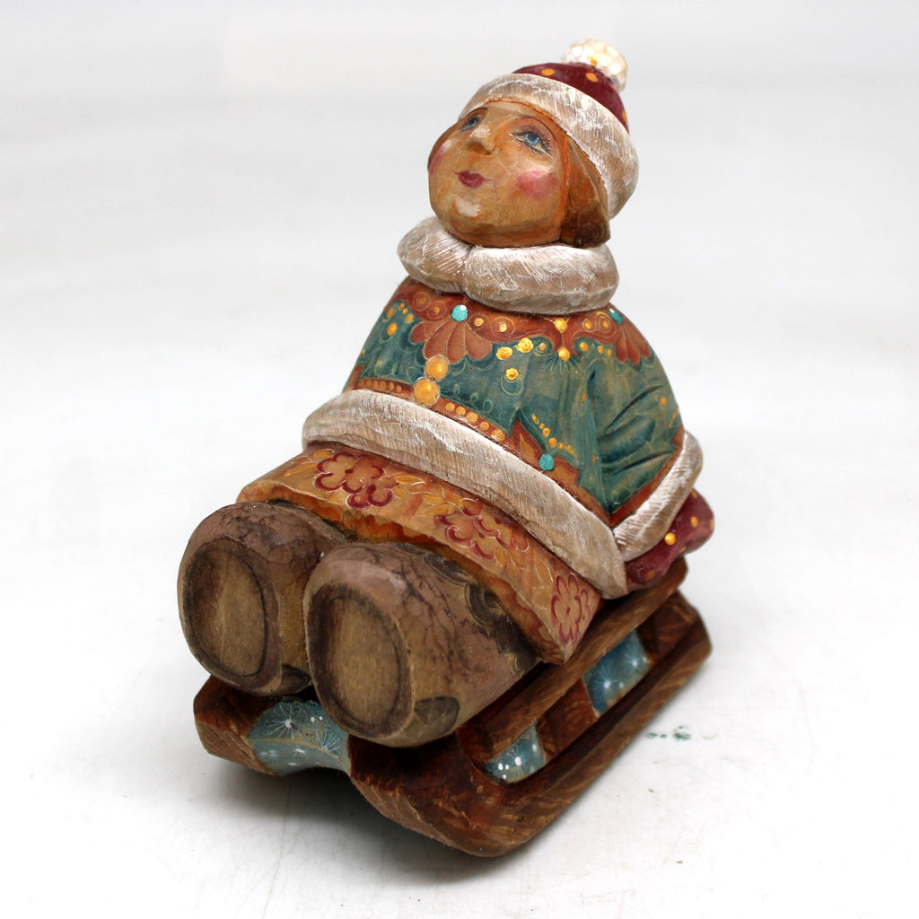 One-of-a-Kind - Girl on Sleigh WOODCARVED Figurine 4.5x3.5x2.5 by G.DeBrekht - Unique Handcrafted and Hand-Painted Collectible