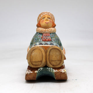 One-of-a-Kind Girl on Sleigh WOODCARVED Figurine 4.5x3.5x3 by G. Debrekht - Unique Handcrafted and Handpainted Collectible
