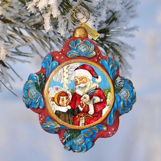 A colorful ornament featuring a Santa Claus figure and a child, hanging on a tree branch with snow.