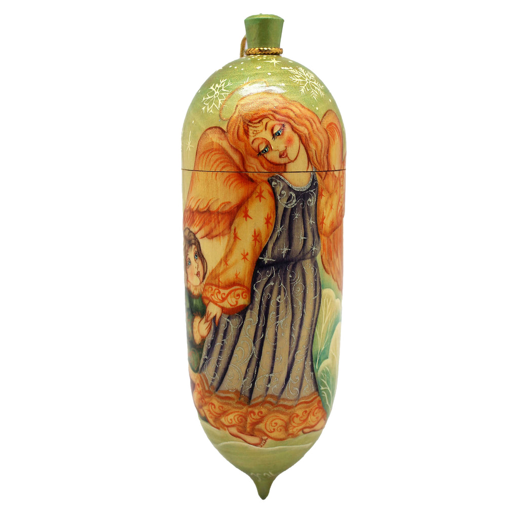 a decorative ceramic object with a painted design depicting a woman with orange hair and wings.