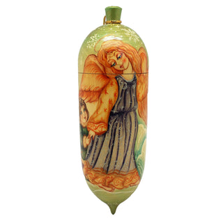 a decorative ceramic object with a painted design depicting a woman with orange hair and wings.