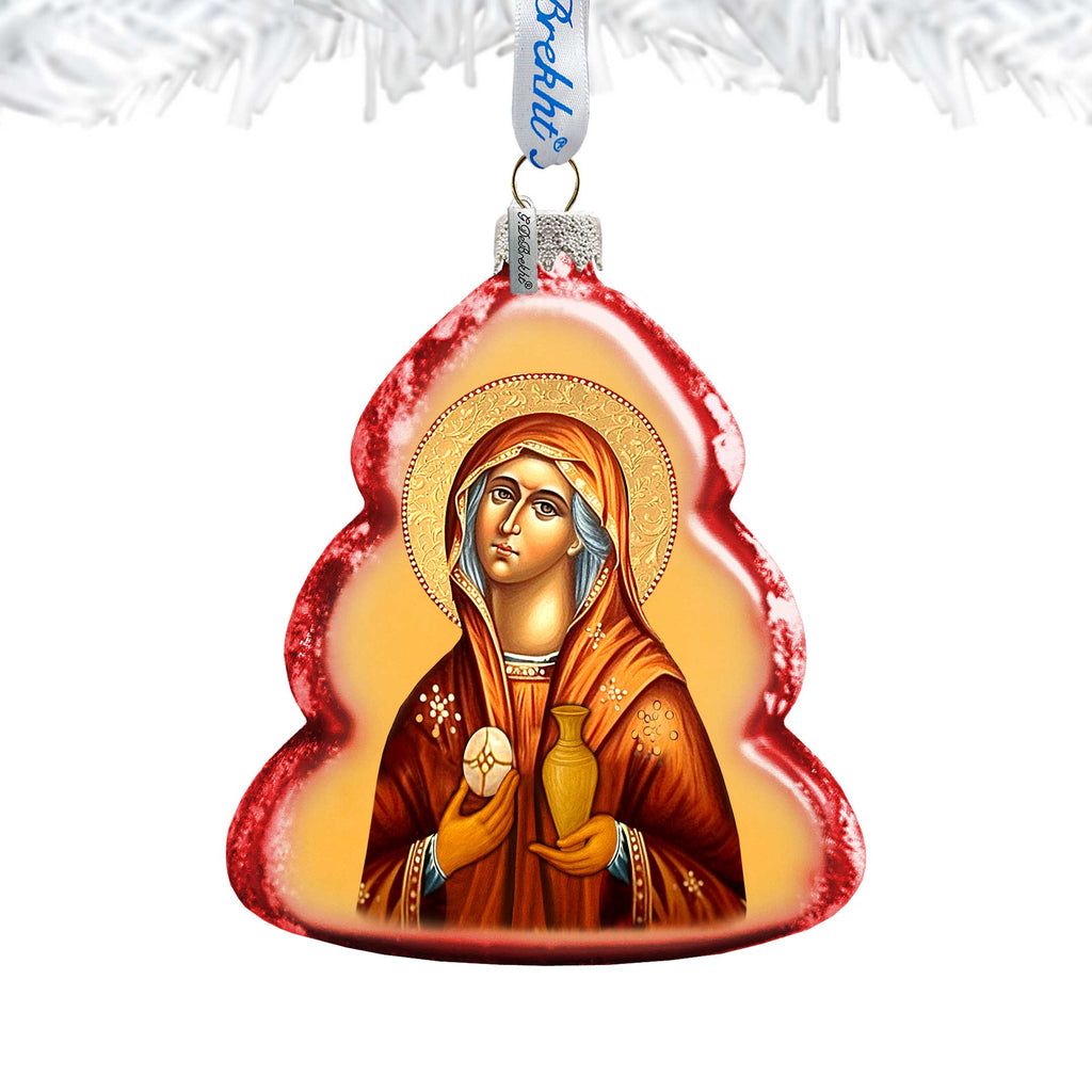 A Christmas ornament in the shape of a tree, featuring a depiction of a religious figure.
