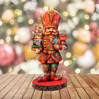 a wooden table topped with a figurine of a nutcracker