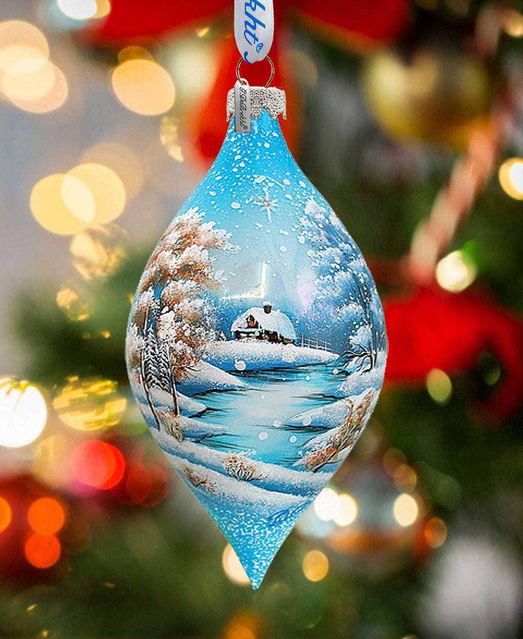 a christmas ornament hanging from a christmas tree