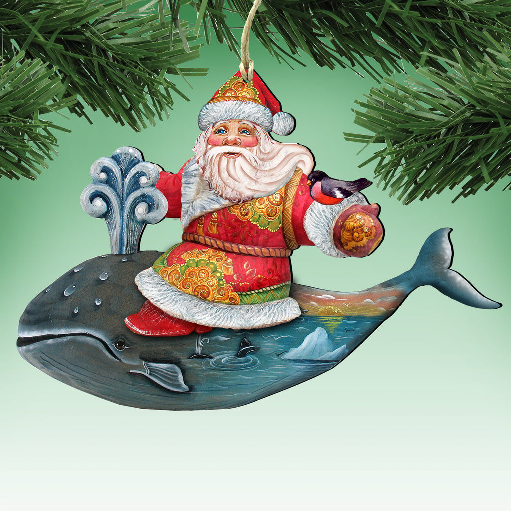 Santa Claus ornament with a whale and bird on a tree branch
