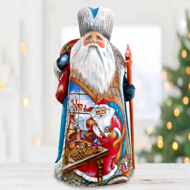 A colorful, hand-painted figurine of Santa Claus, with intricate details and a festive holiday theme.