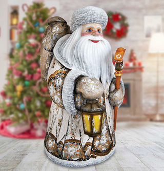 Holding Lantern Santa Woodcarved Figurine Unique hand carvings made from Linden wood. Fine details and beautiful artwork. Hand-Painted by world-renowned artists, limited edition collectibles. 820105