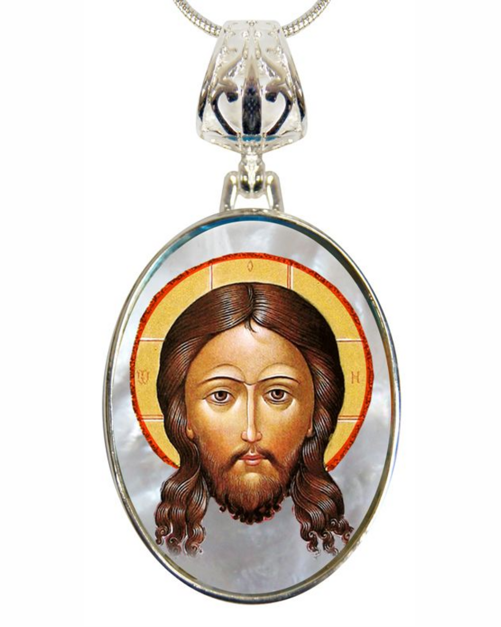 a pendant with a depiction of Jesus Christ's face.