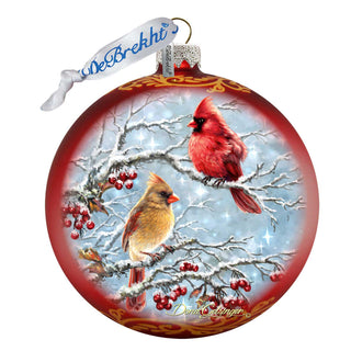a christmas ornament with a cardinal and a cardinal on it