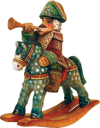 A wooden toy figurine depicting a man riding a rocking horse while blowing a trumpet.