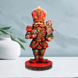 a colorful figurine of a nutcracker holding a nutcracker