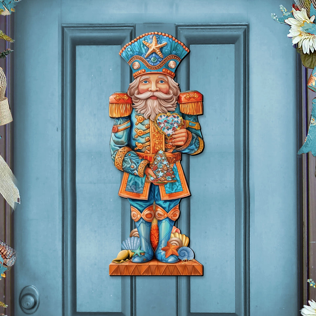 A colorful nutcracker figure is displayed on a door, holding a nutcracker and a nut.