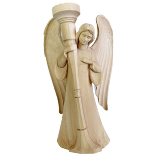 A wooden sculpture of an angel holding a torch, with wings and a flowing robe.