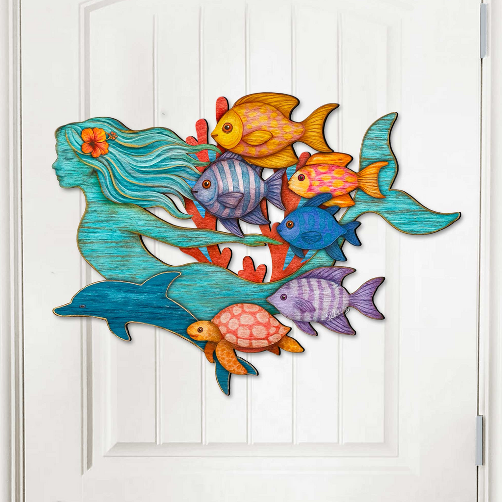 Colorful mermaid coastal wall decor with tropical fish, dolphin, and sea turtle, handcrafted by GDebrekht Artistic Studio. Made in the USA, this nautical door hanger features vivid ocean life details and weathered wood texture, perfect for coastal holiday decor, beach house accents, or undersea-themed gifts. Ideal for indoor or outdoor coastal door decorations.