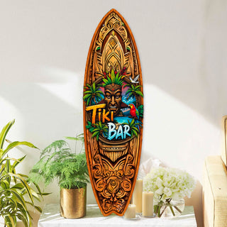 Handcrafted Tiki Bar Surfboard Wall Art by G. DeBrekht, featuring a bold tiki mask, palm trees, tropical sunset, and vibrant parrot. Perfect coastal wall decor for tiki bars, beach house interiors, and island-themed spaces. UV-coated for indoor & outdoor display.