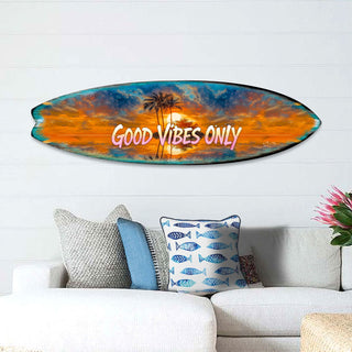 Handcrafted Good Vibes Only Surfboard Wall Art by G. DeBrekht, featuring a tropical sunset, palm trees, and bold lettering. Perfect coastal wall decor for beach houses, surf-themed spaces, and tropical interiors. UV-coated for indoor & outdoor display.
