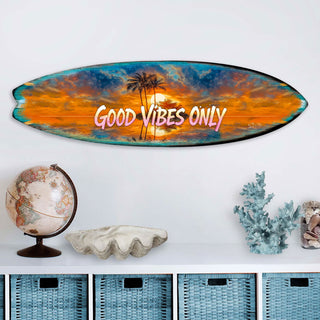 Handcrafted Good Vibes Only Surfboard Wall Art by G. DeBrekht, featuring a tropical sunset, palm trees, and bold lettering. Perfect coastal wall decor for beach houses, surf-themed spaces, and tropical interiors. UV-coated for indoor & outdoor display.