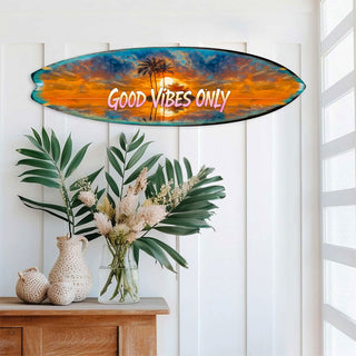Handcrafted Good Vibes Only Surfboard Wall Art by G. DeBrekht, featuring a tropical sunset, palm trees, and bold lettering. Perfect coastal wall decor for beach houses, surf-themed spaces, and tropical interiors. UV-coated for indoor & outdoor display.